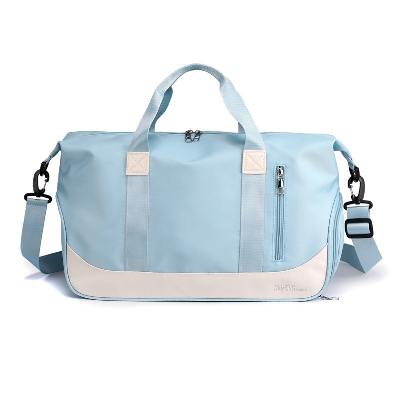 A blue and white duffel bag with a main compartment and a shoe compartment, featuring a zipper closure and a handle.