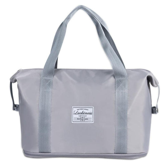 A grey single extension gym bag with a large capacity