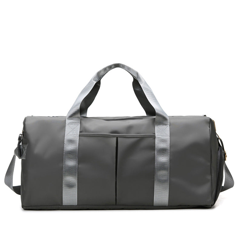 A grey travel and gym bag with multiple compartments-Dubai