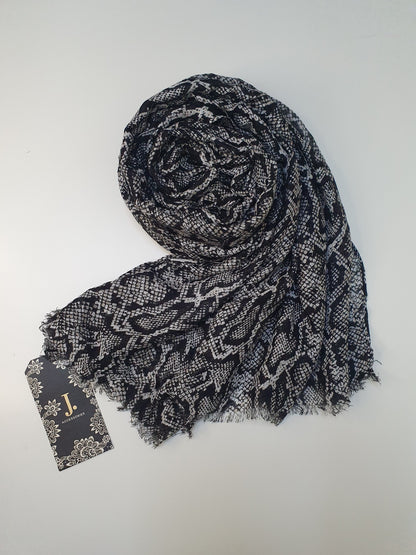 Black and white patterned scarf by J.