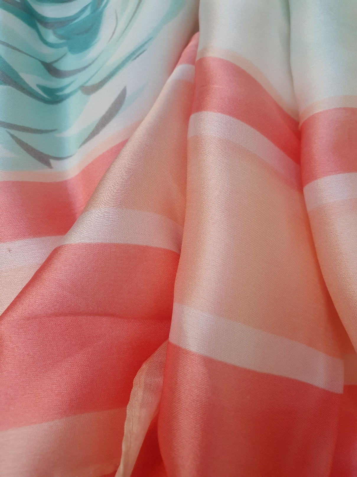 Close-up of J. silk stole