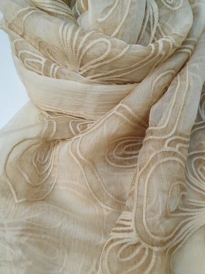 Close-up of beige J. stole-Online UAE