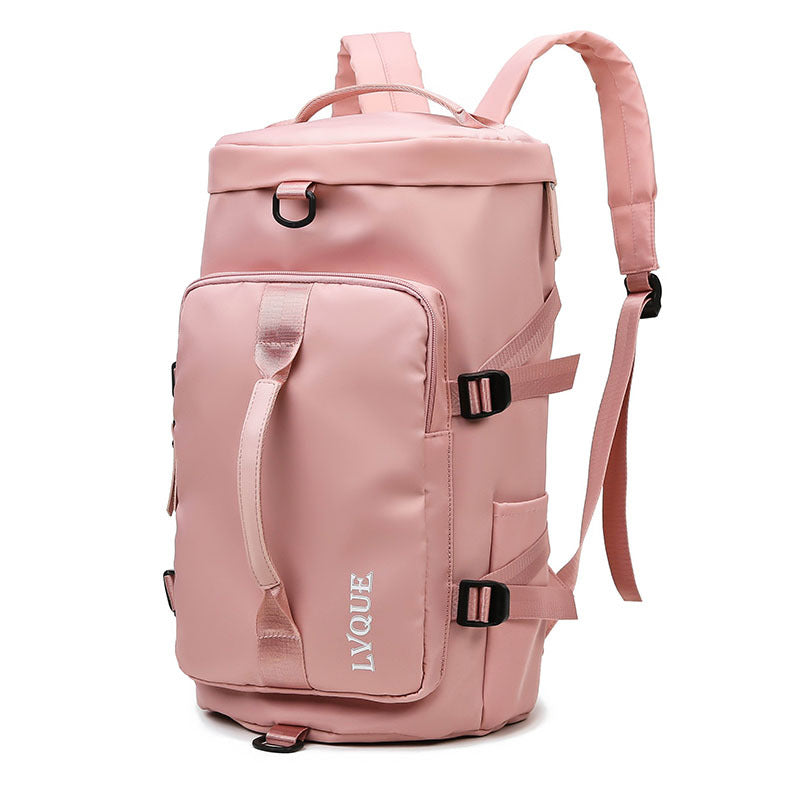 A pink bag cum backpack with a zipper closure, multiple compartments, adjustable straps and multiple carrying options