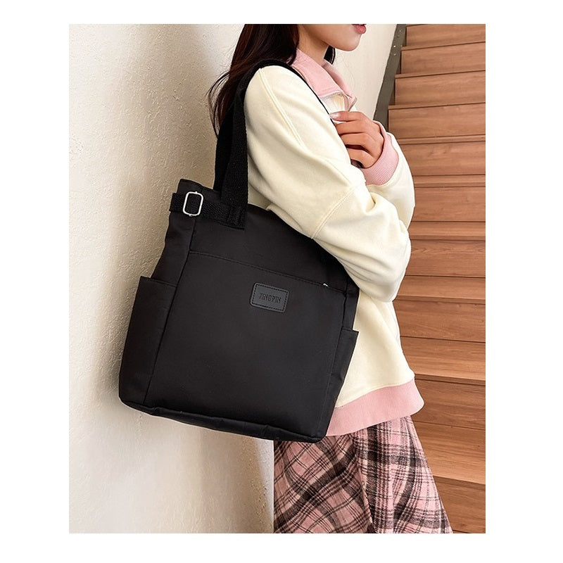 Women black shoulder bag with multiple pockets