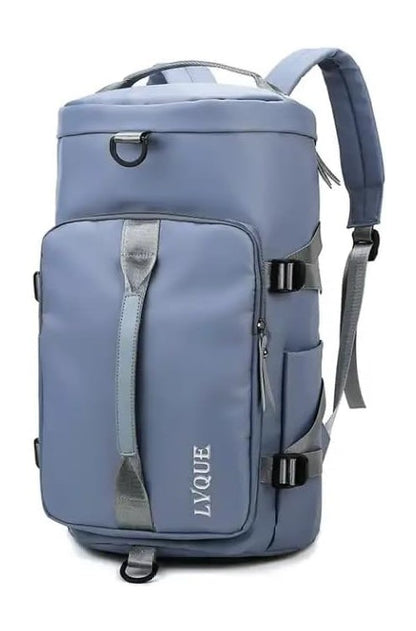 A blue bag cum backpack with a zipper closure, multiple compartments, adjustable straps and multiple carrying options