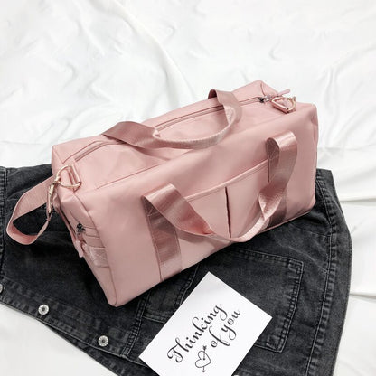 A pink travel and gym bag with multiple compartments-Online Khaas Trends