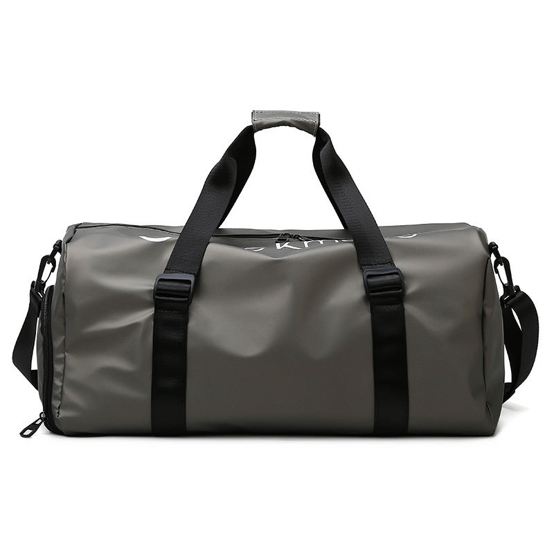 A gray Gym Fitness Bag with black straps, featuring a waterproof material and a spacious design.