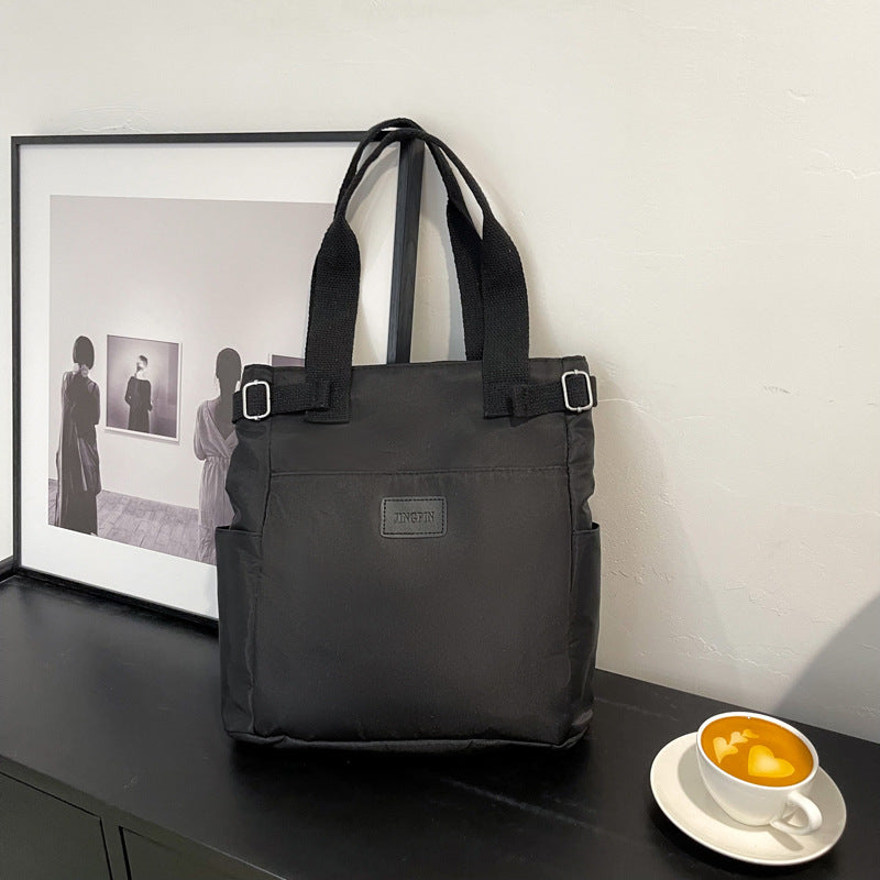 Black shoulder bag with multiple pockets-Khaas Trends Dubai