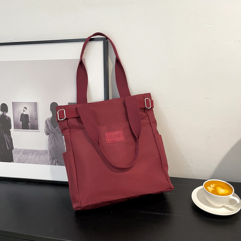 Maroon shoulder bag with multiple pockets for women-Dubai 