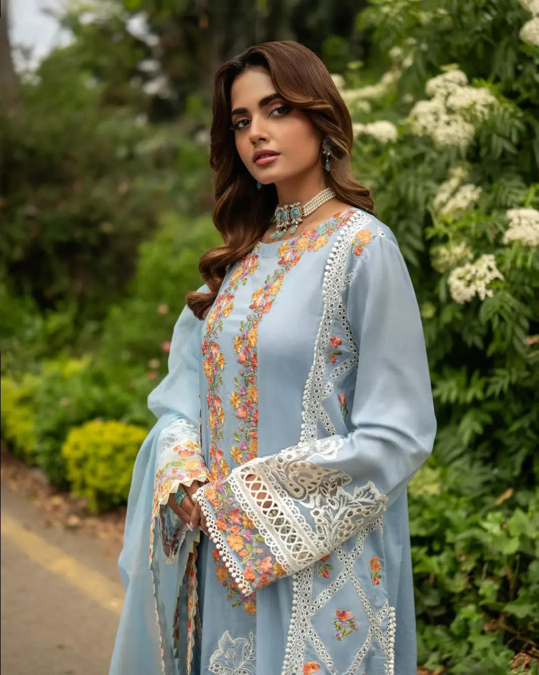 A Pakistani traditional blue embroidered luxury suit with floral patterns-2pc Women PRET