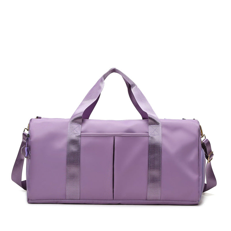 A purple travel and gym bag with multiple compartments-Dubai