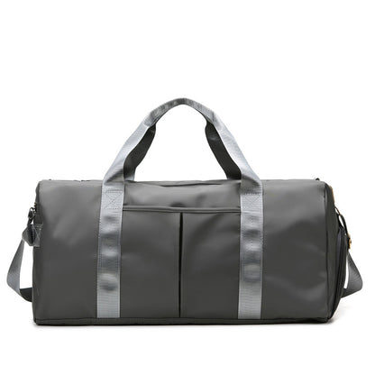 A grey travel and gym bag with multiple compartments-Dubai