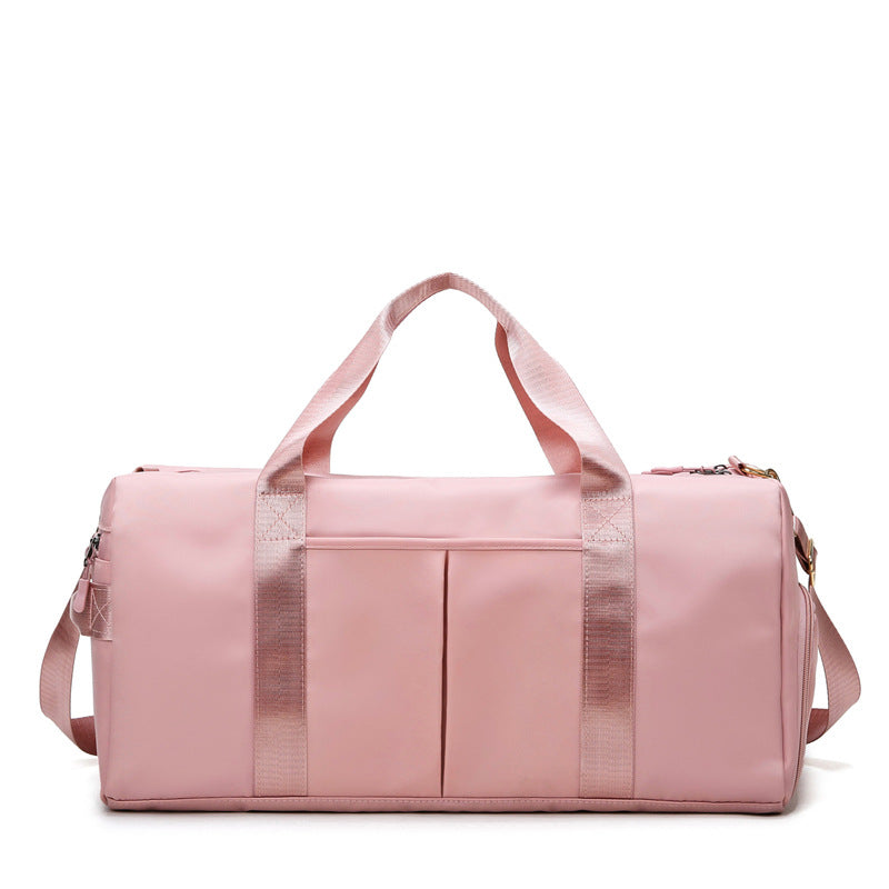 A pink travel and gym bag with multiple compartments-Online Dubai
