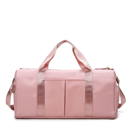 A pink travel and gym bag with multiple compartments-Online Dubai